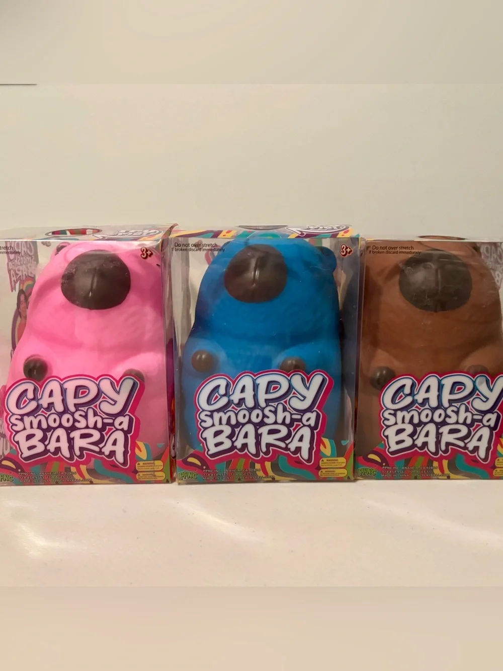 Capy Cabybara Smoosh-a-Bara Squishy Toy - Pink / Blue / Brown